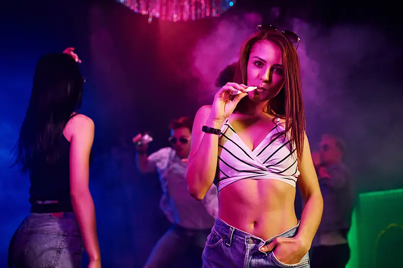 Private stripper vaping in a club